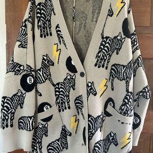 Dressed in LALA Cream and Black Zebra Cardigan